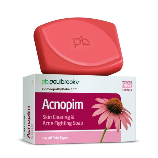 Paul Brooks Acnopim Soap 100g Red soap bar with 'pb' logo on a white background, next to its packaging labeled 'Acnopim' by Paulbrooks.