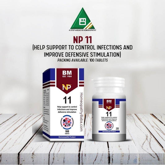 BM NP 11 supplement packaging on a wooden surface with a white background


