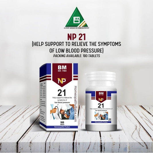 BM NP 21 homeopathy product packaging on a wooden surface with a white background

